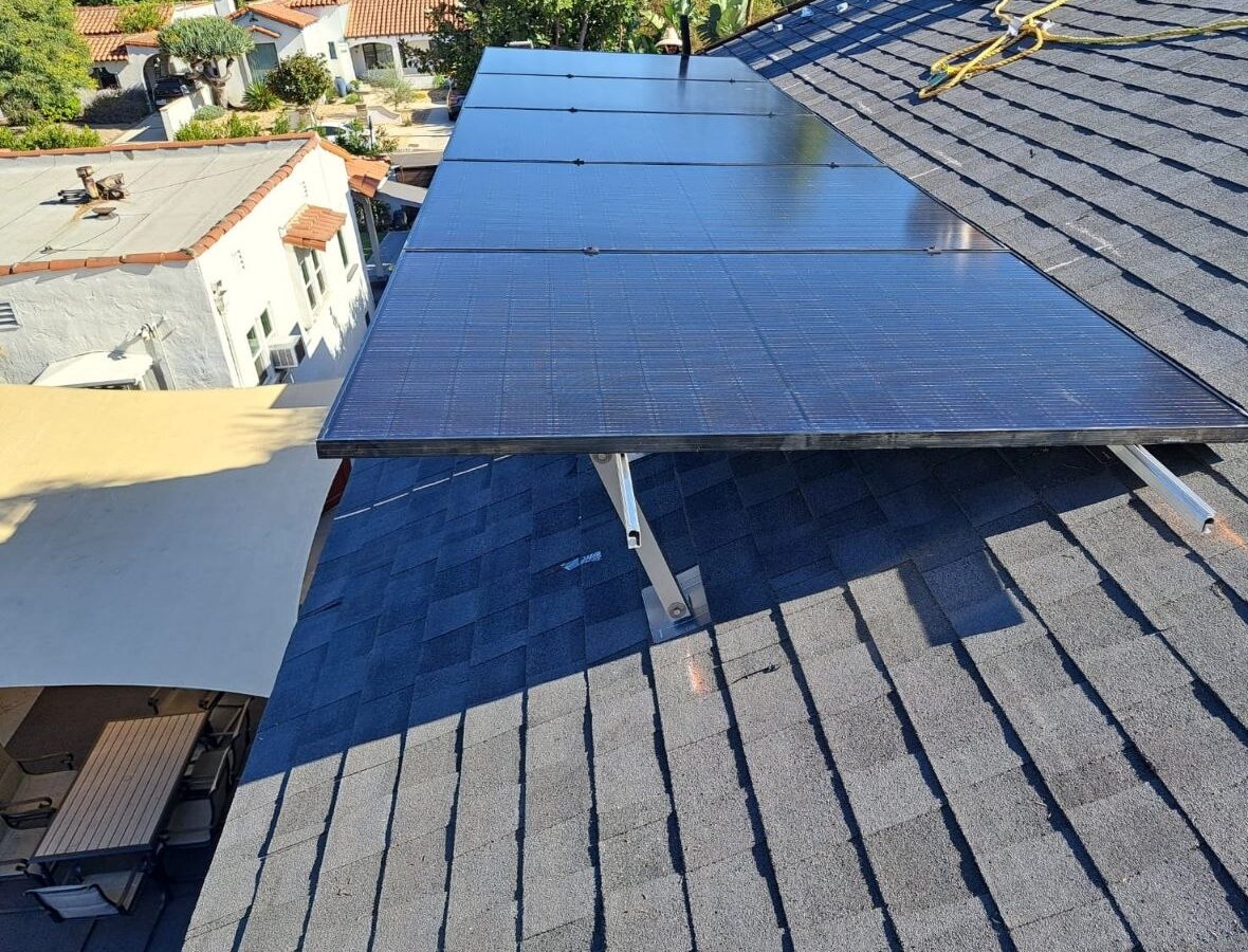 Tilt-mount solar array over a residential roof — solar-integrated build by PBG, Los Angeles.