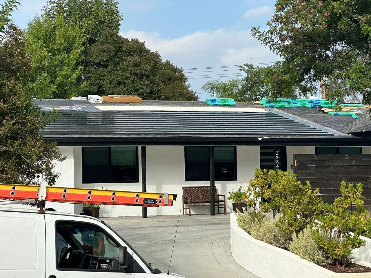 Solar shingle roof install nearing completion on a single-story residence — PBG job site, Los Angeles.